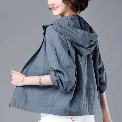 Veste de sport courte femme, à capuche, avec fermeture éclair