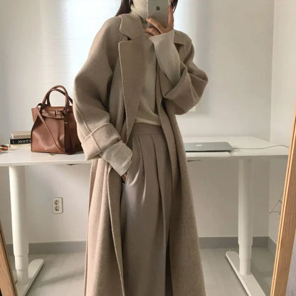 Veste d'hiver femme classique longue et élégante