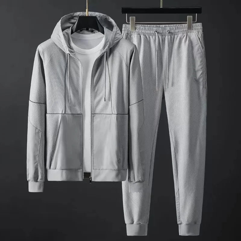 Pantalon de survêtement sportif avec capuche et fermeture éclair