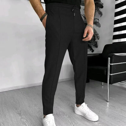 Pantalon de jogging homme élastique coupe slim confortable