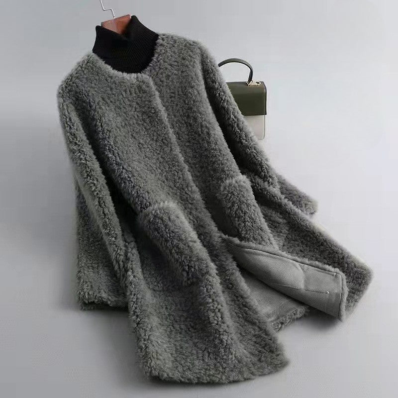 Manteau d'hiver en peau lainée pour femme avec poches