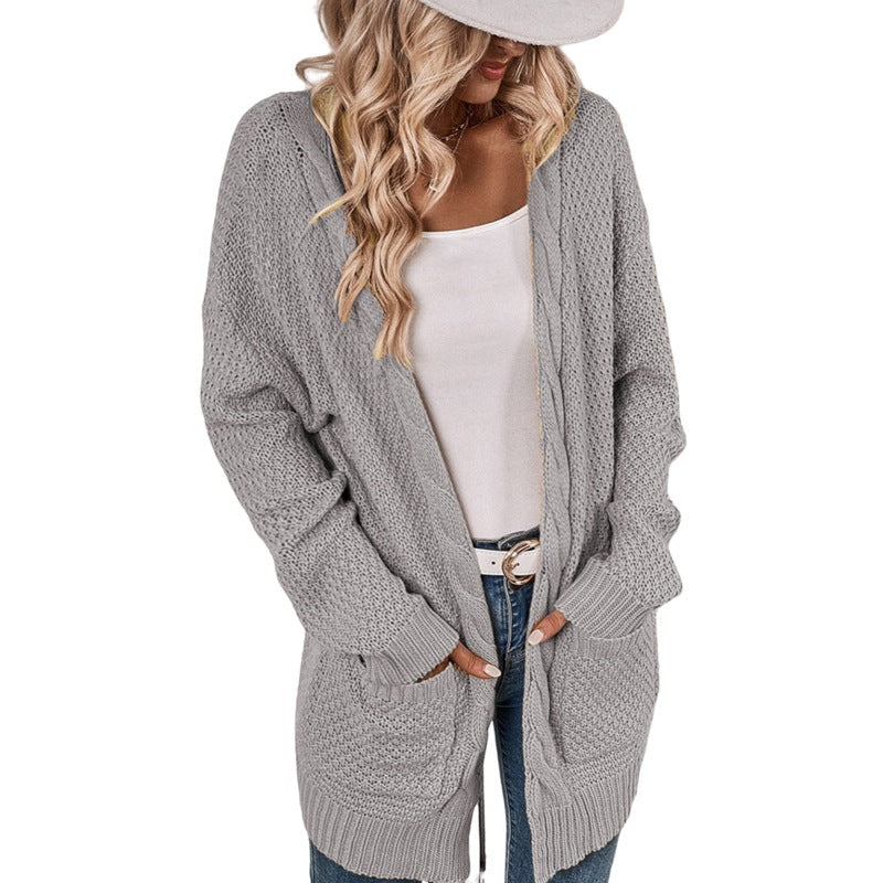 Cardigan en tricot pour femme coupe généreuse avec poches design élégant