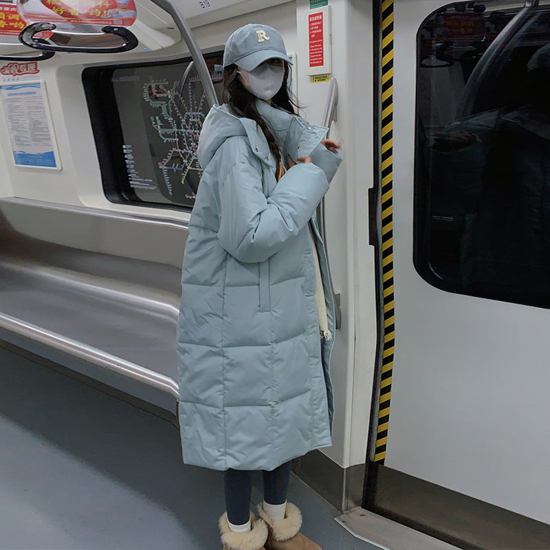 Manteau matelassé long pour femme, design élégant avec poches