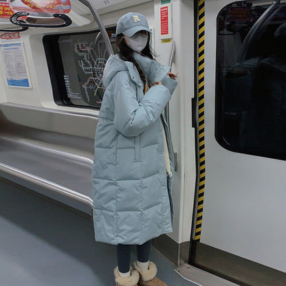 Manteau matelassé long pour femme, design élégant avec poches