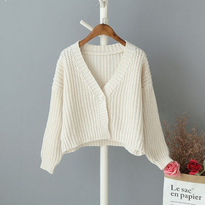 Cardigan femme décontracté, épaules dénudées, fermeture boutonnée