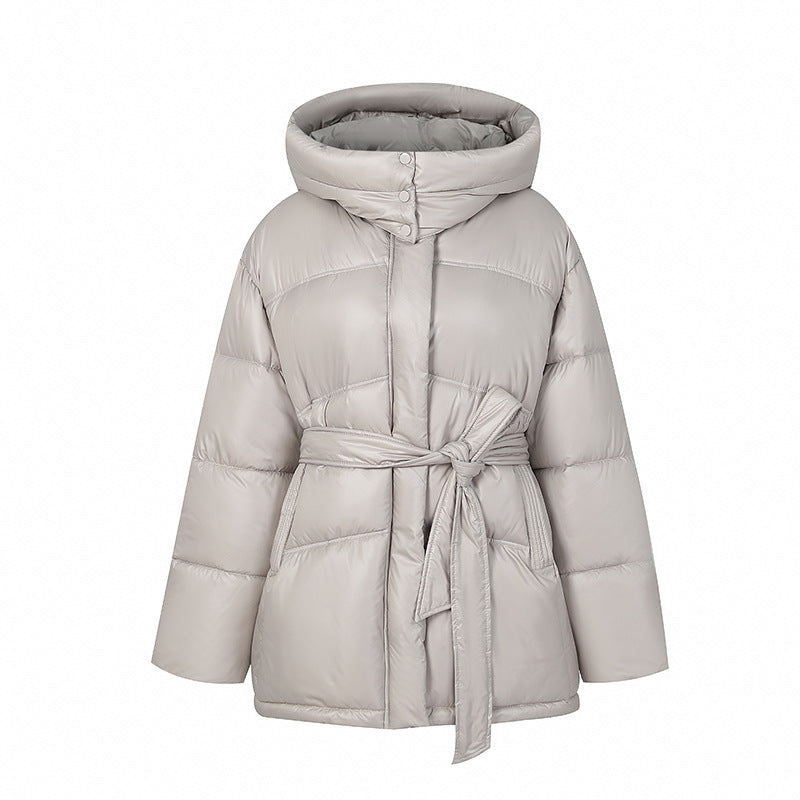 Manteau d'hiver élégant matelassé pour femme avec ceinture et capuche