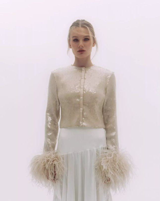 Chemisier élégant pour femme avec plumes, design chic