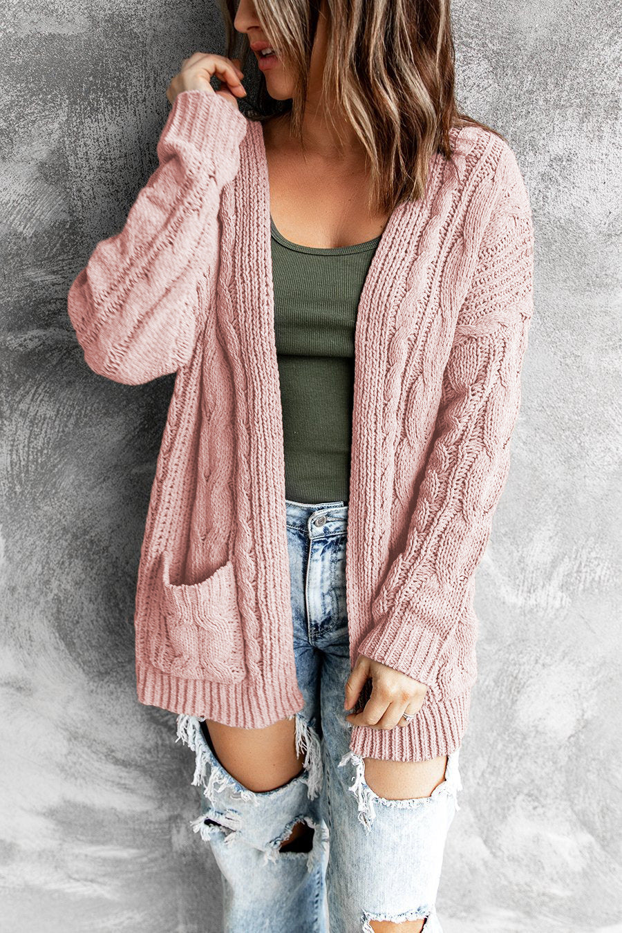Gilet en maille pour femme avec manches oversize et poches plaquées