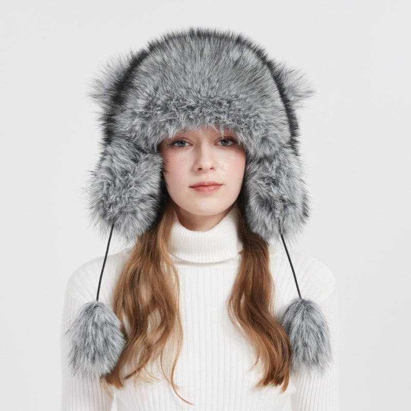 Bonnet souple pour femme avec pompon en fausse fourrure