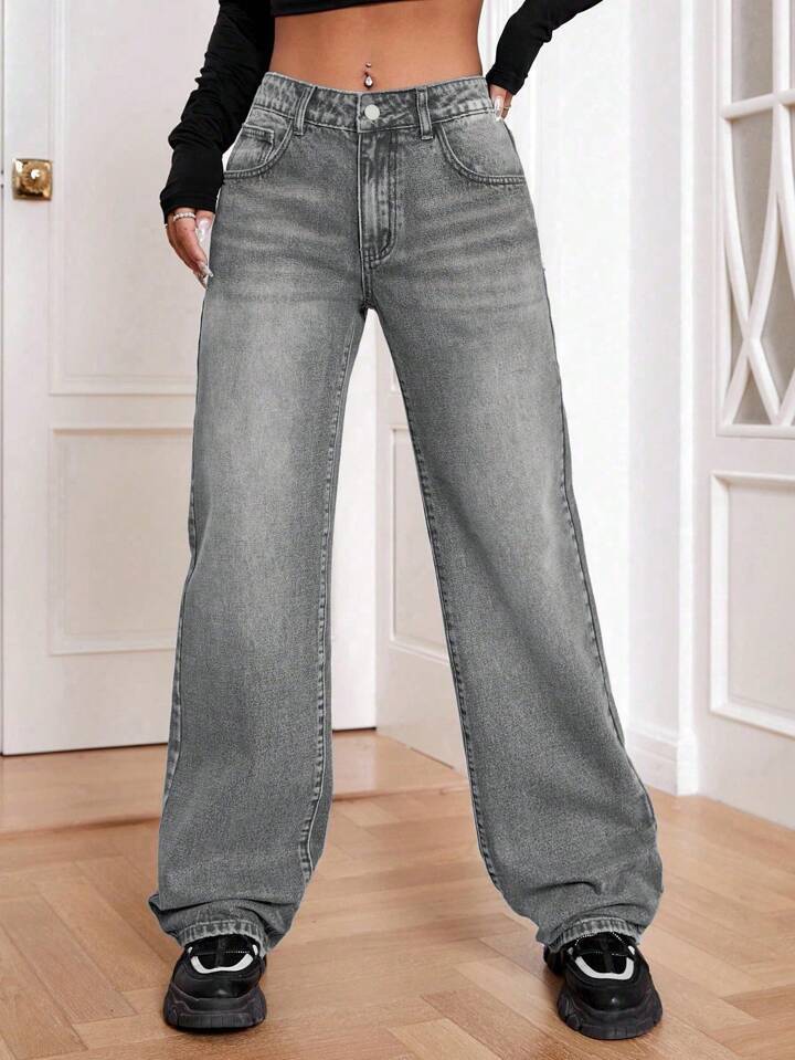 Jeans taille haute relax coupe décontractée effet usé femme