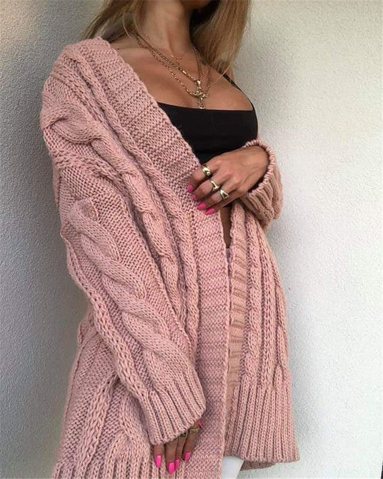 Robe en laine grande taille à motif torsadé et col en V