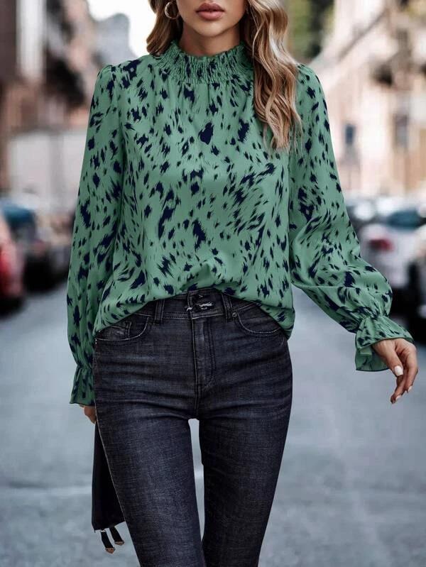 Chemisier femme élégant motif animalier col à volants