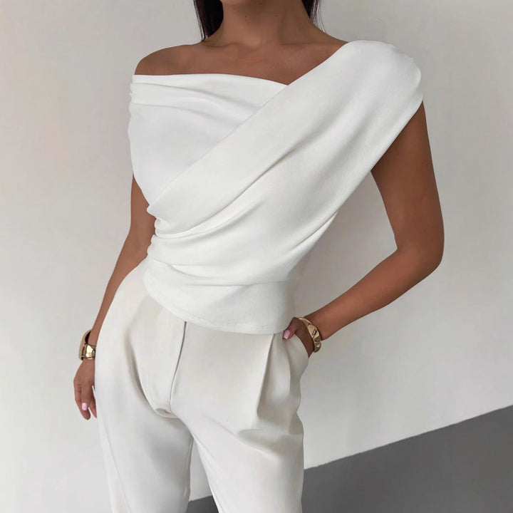 Haut féminin élégant coupe asymétrique