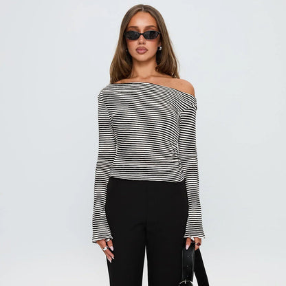 Haut asymétrique à pois pour femme - design moderne