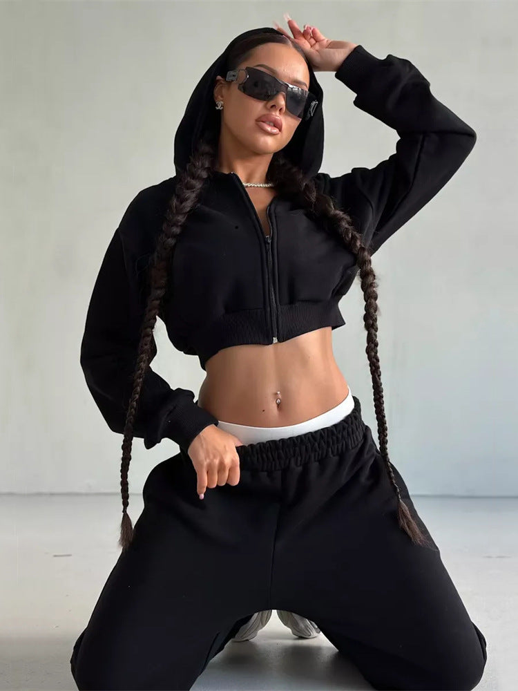 Tenue de sport pour femme : ensemble veste courte et pantalon de jogging