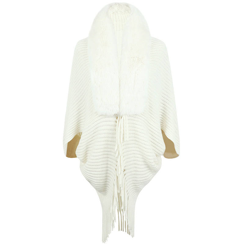 Poncho de luxe tricoté pour femme avec col en fausse fourrure et franges