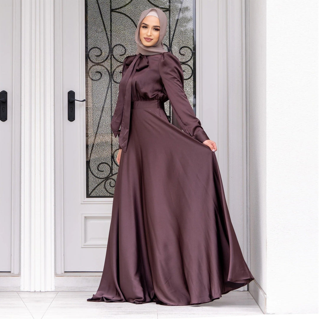 Élégante robe longue pour femme avec manches amples et ceinture fine à la taille