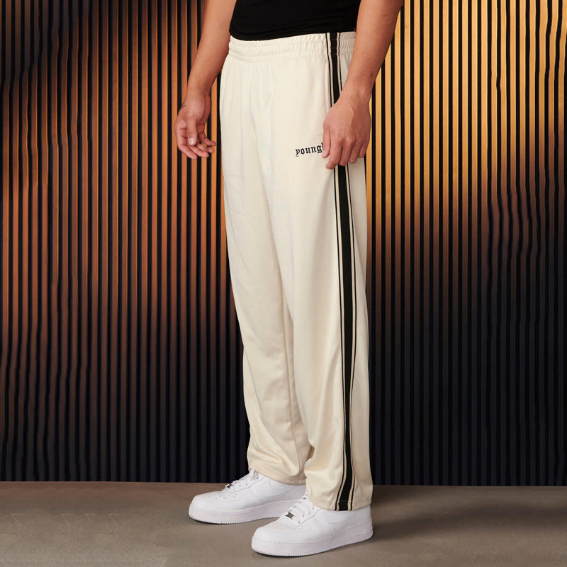 Pantalon de jogging sportif homme avec bandes contrastantes