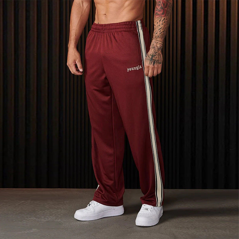 Pantalon de jogging sportif homme avec bandes contrastantes