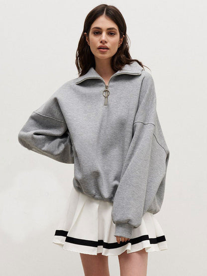 Pull femme moderne col montant zippé