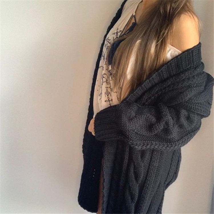 Robe en laine grande taille à motif torsadé et col en V