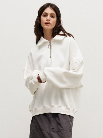 Pull femme moderne col montant zippé
