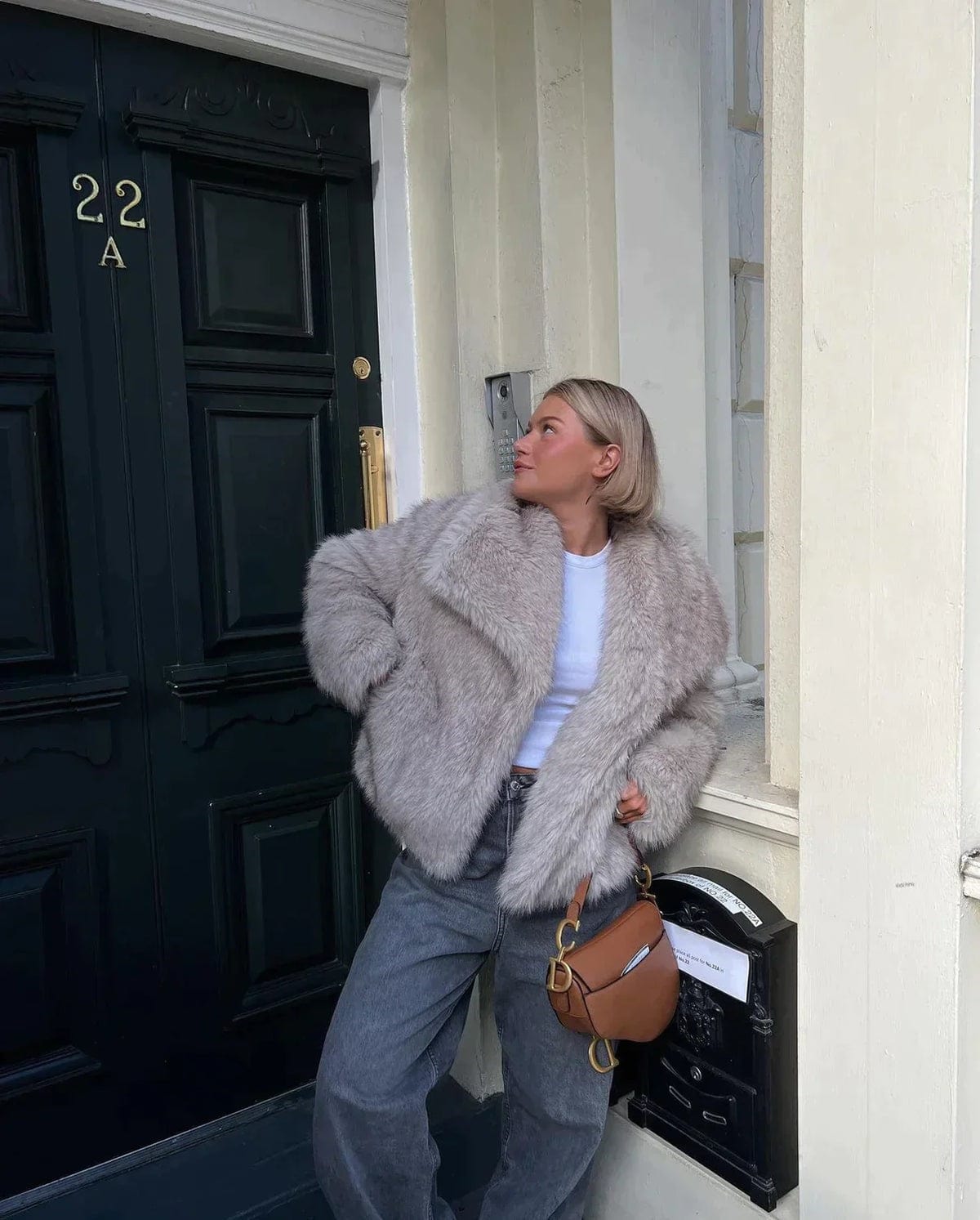 Élégant manteau d'hiver pour femme avec garniture en fourrure