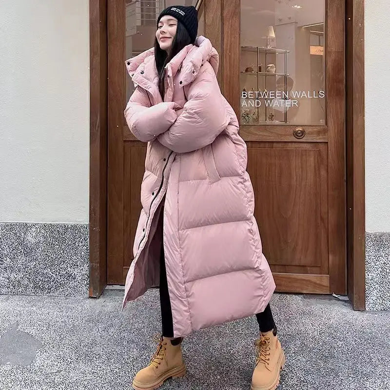 Longue doudoune matelassée chaude à capuche pour femme