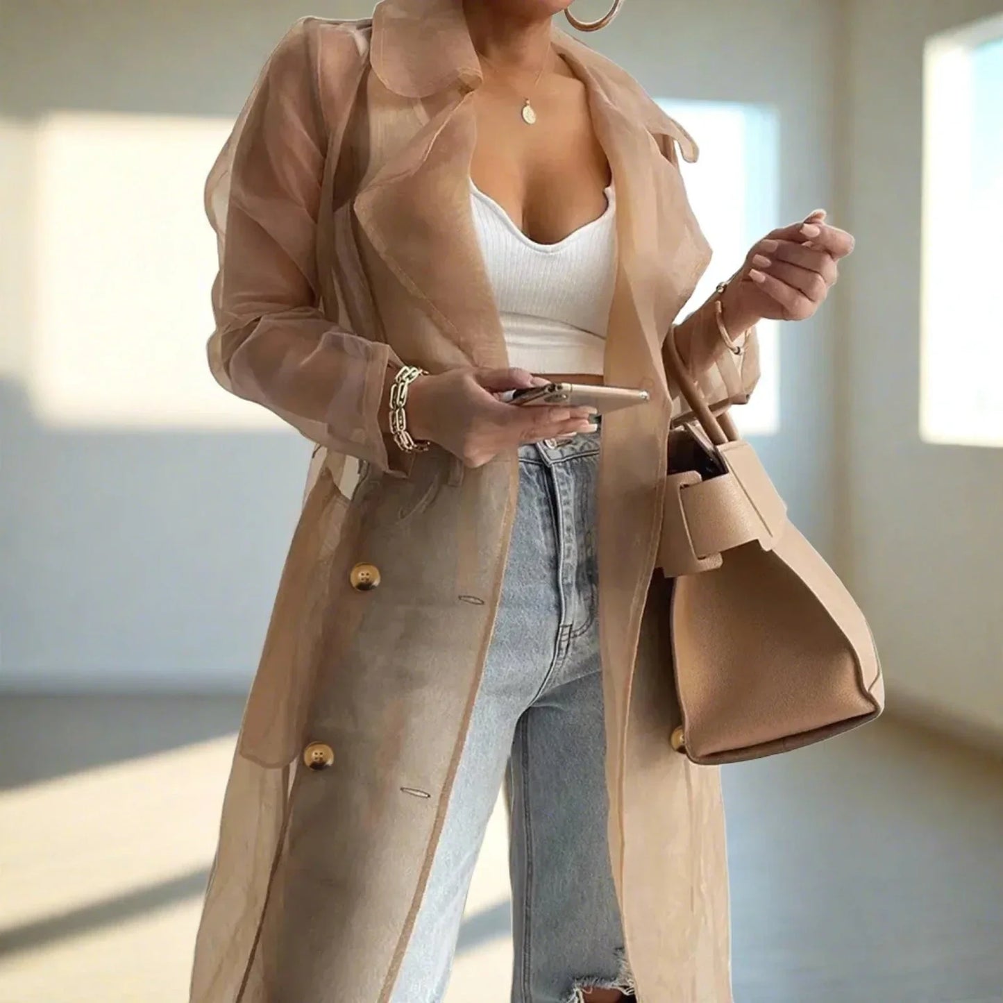 Imperméable élégant transparent