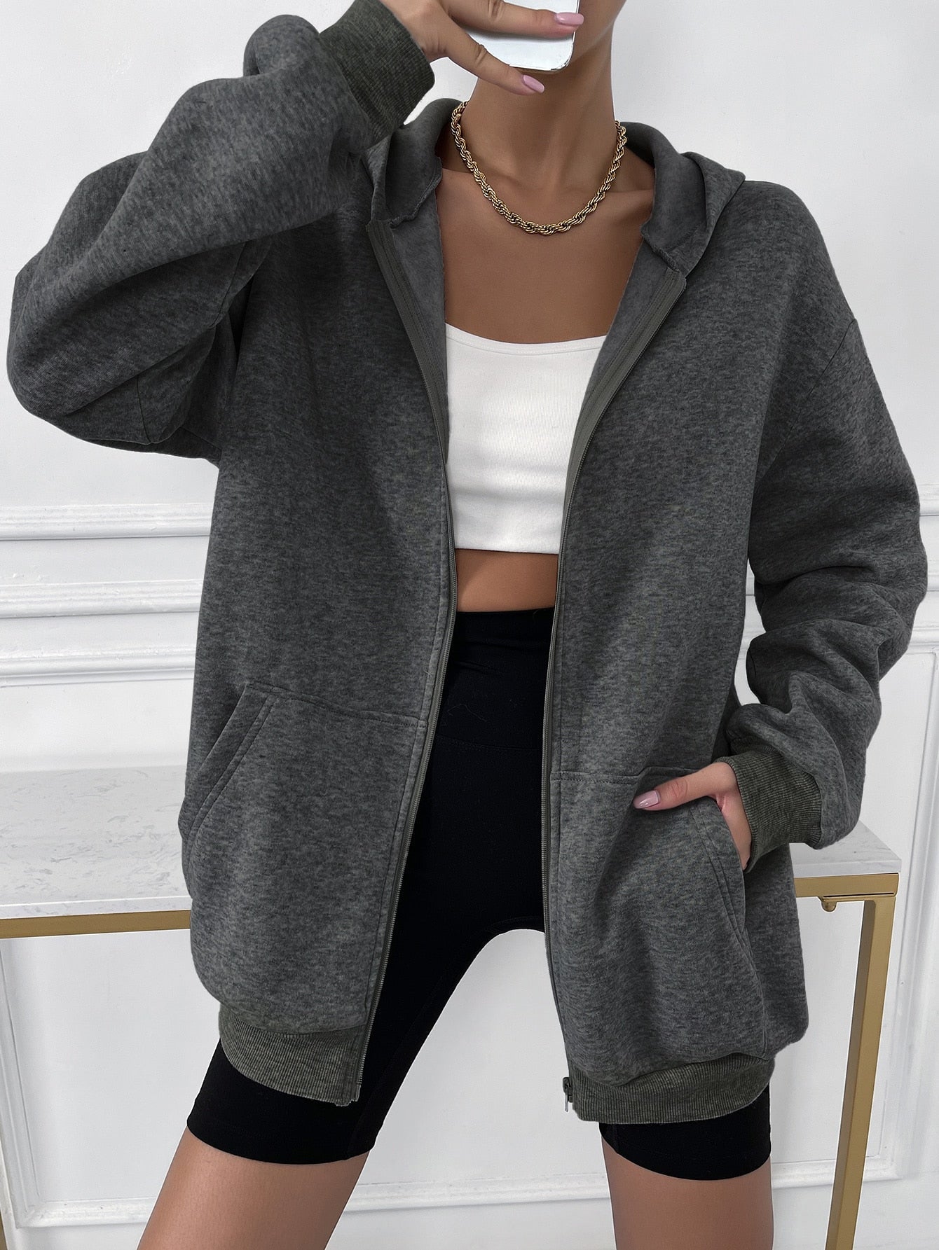 Gilet femme élégant avec capuche et fermeture éclair