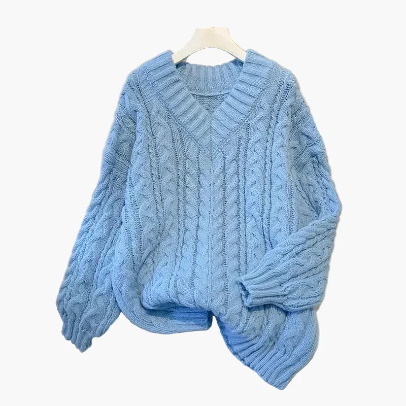 Pull en grosse maille col V motif torsadé hiver