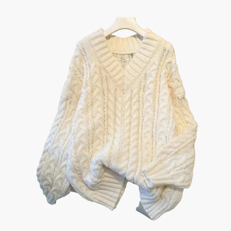 Pull en grosse maille col V motif torsadé hiver