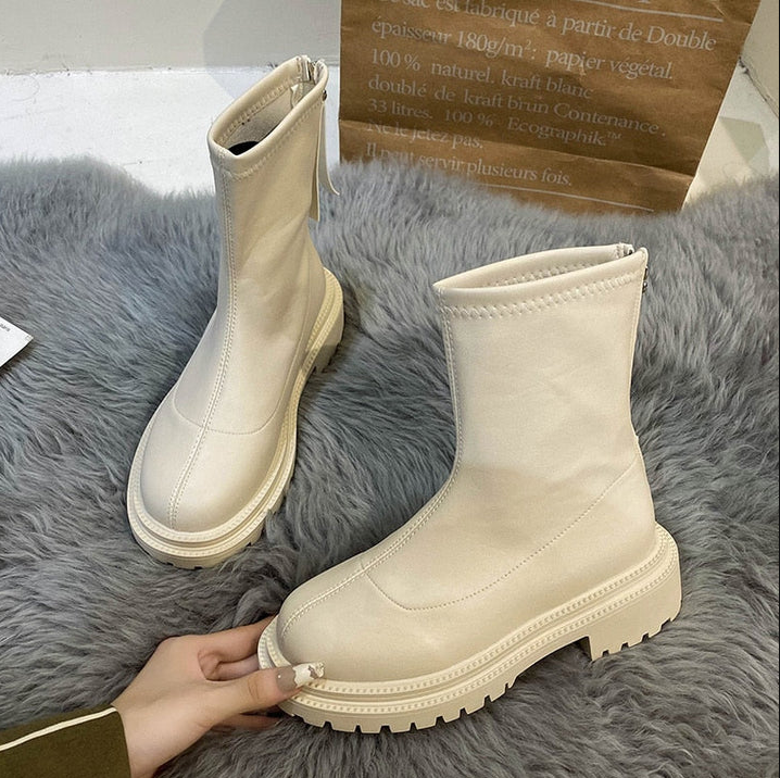 Bottes femme moderne aspect cuir