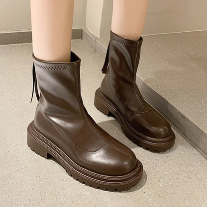 Bottes femme moderne aspect cuir