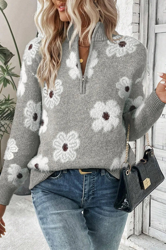 Pull femme à motifs floraux et demi-zip
