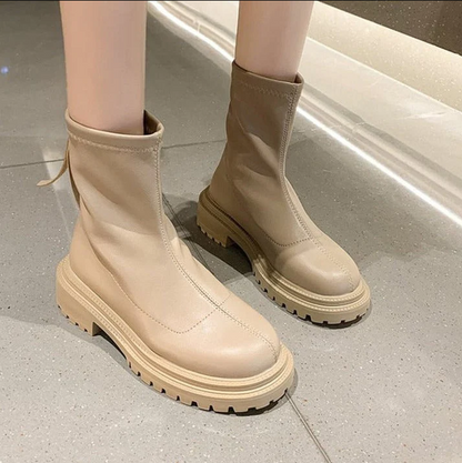 Bottes femme moderne aspect cuir