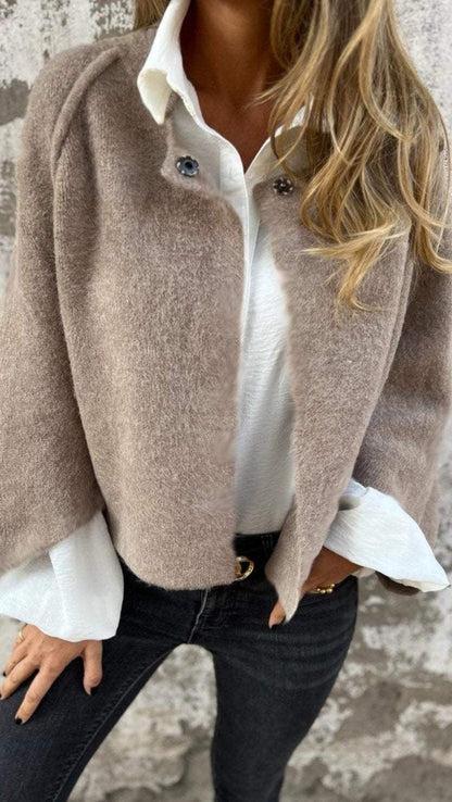 Élégant manteau pour femme à la coupe ajustée