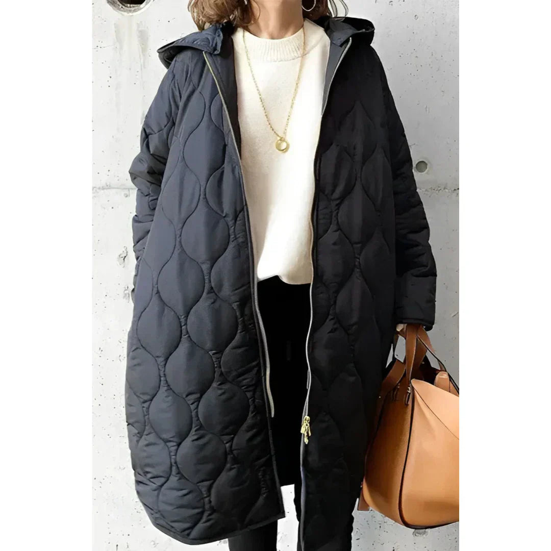 Veste matelassée oversized longue à capuche
