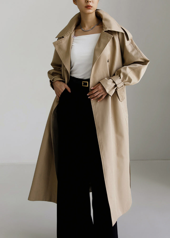 Trench-coat stylé pour femme avec col cape et poches latérales