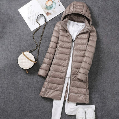 Doudoune longue d'hiver élégante avec capuche pour femme