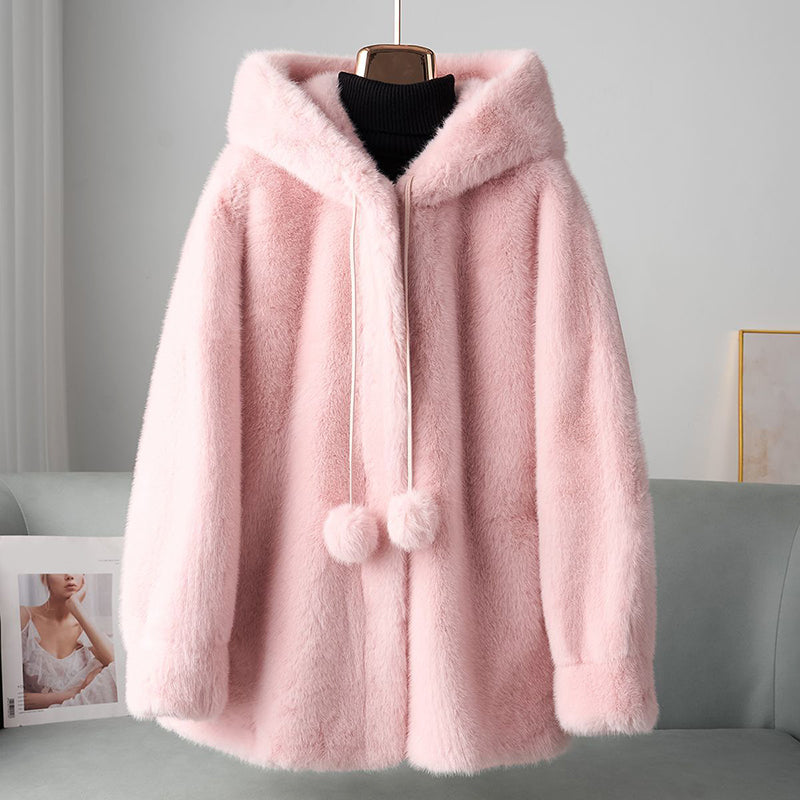 Veste chic en fausse fourrure avec détails pompon