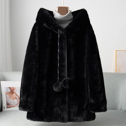 Veste chic en fausse fourrure avec détails pompon