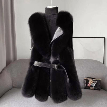 Gilet stylé en fausse fourrure avec ceinture et détails en cuir