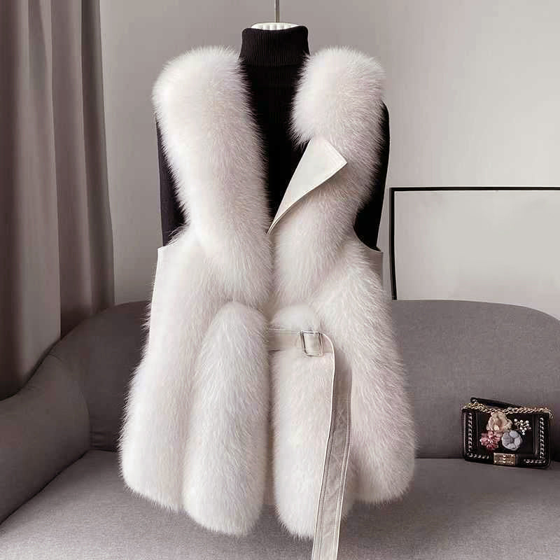 Gilet stylé en fausse fourrure avec fermeture en cuir