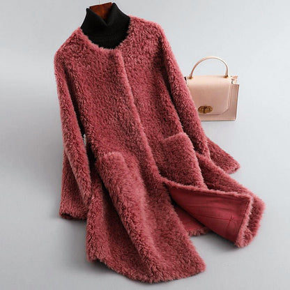 Robe en fausse fourrure douce à col rond
