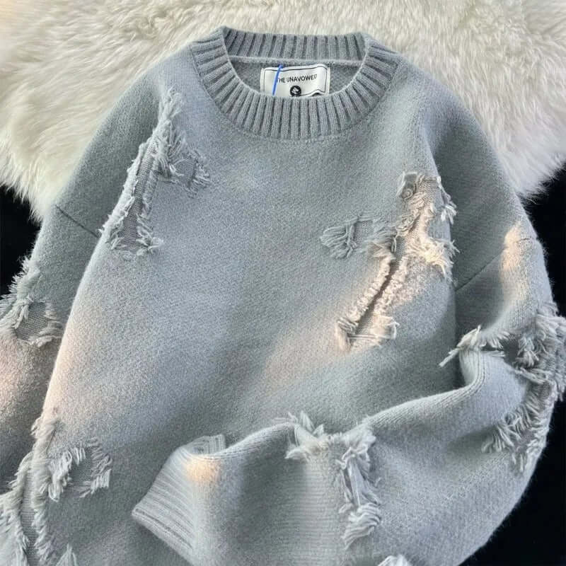 Pull déchiré coupe ample homme