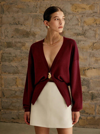 Cardigan élégant en maille fine avec bouton décoratif