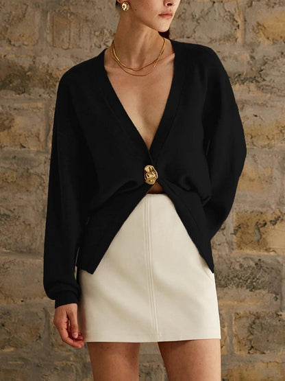 Cardigan élégant en maille fine avec bouton décoratif