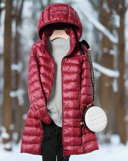 Longue veste matelassée chaude et déperlante pour femme avec capuche