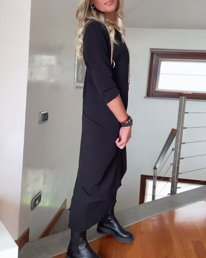 Elegantes Rundhals Kleid mit Plisseefalten - IdealeKleiden